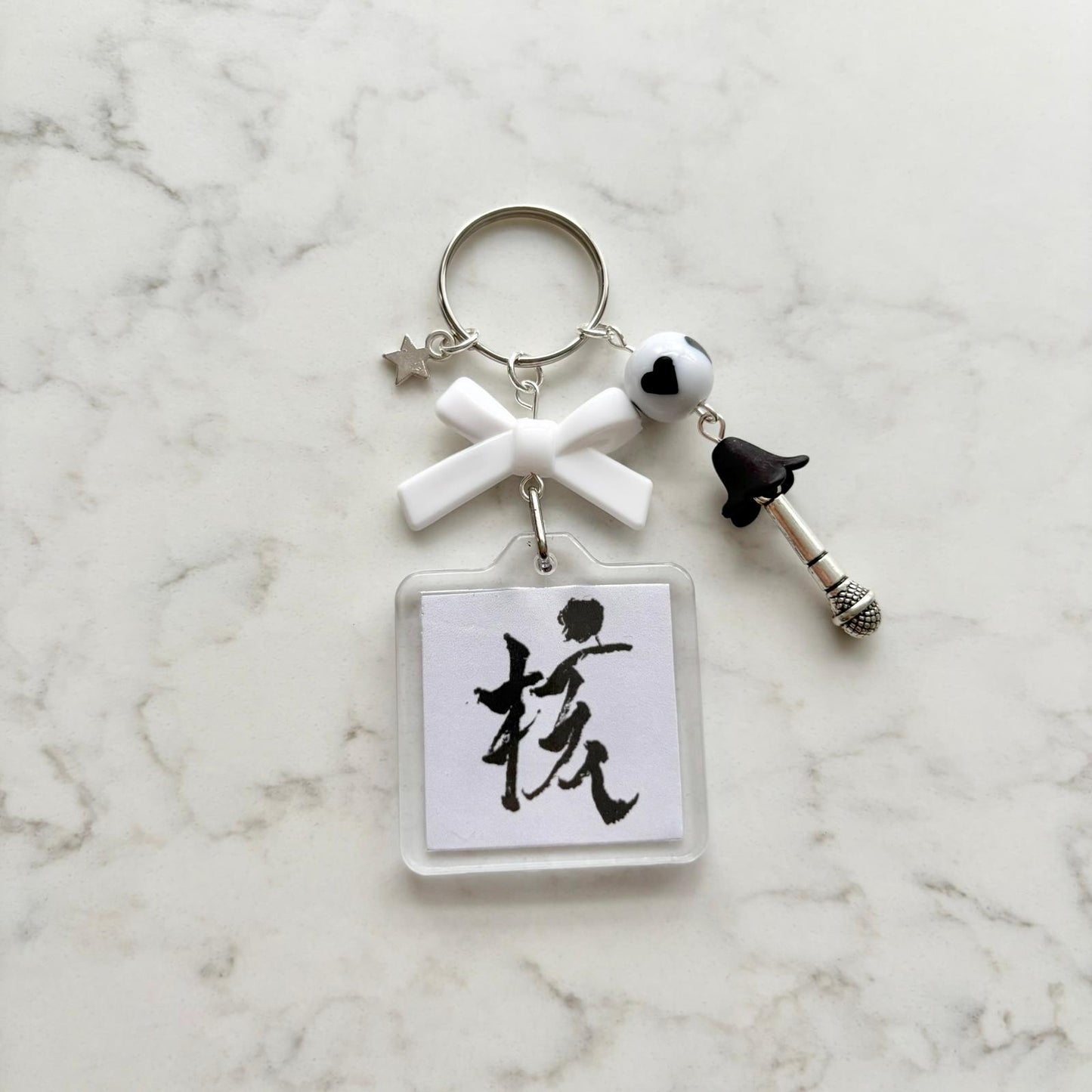 xg interactive album keychain