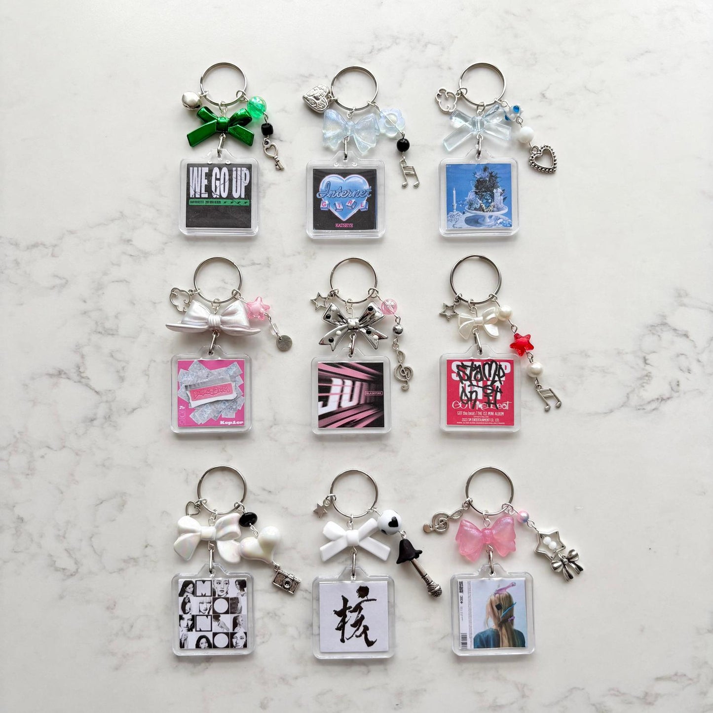 xg interactive album keychain