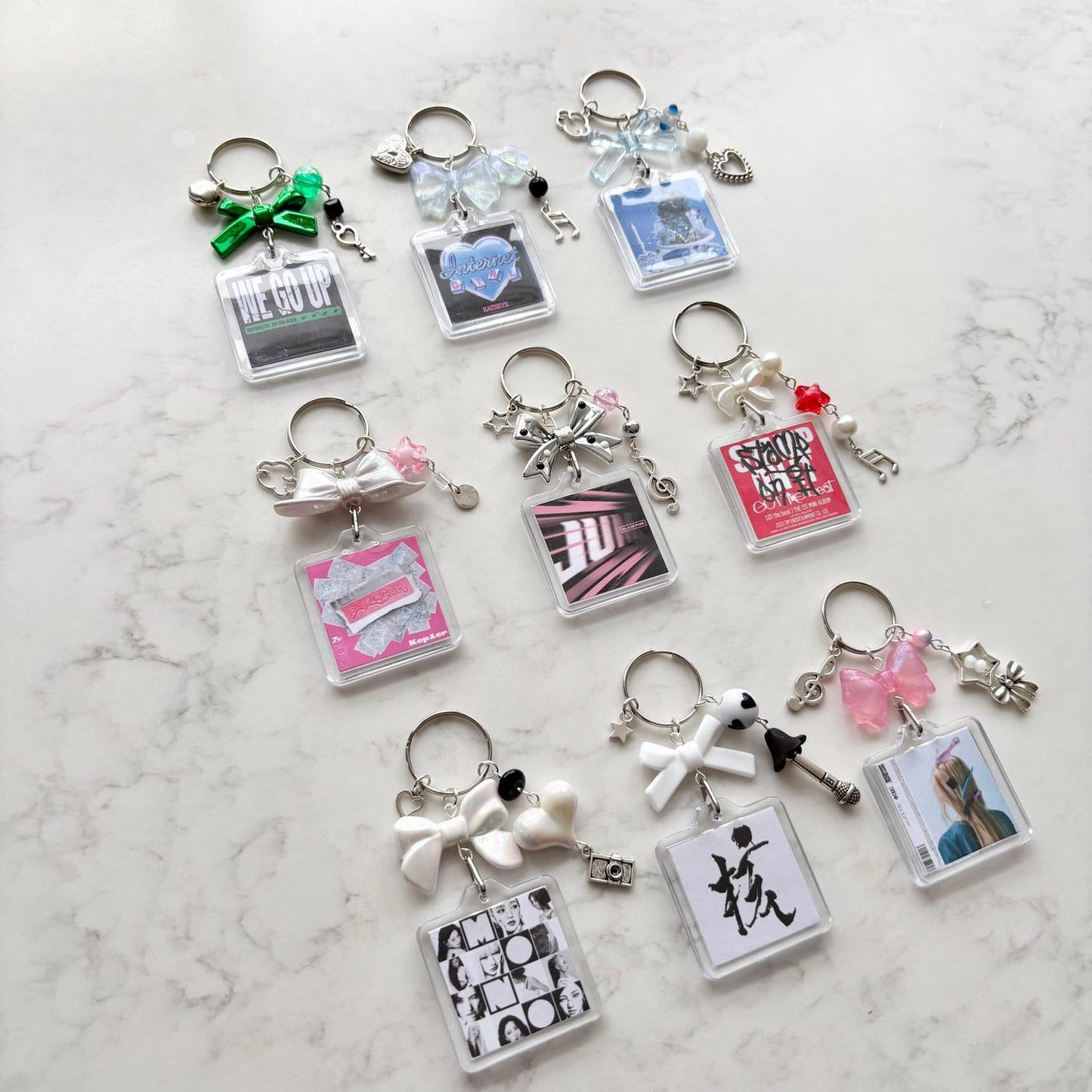 xg interactive album keychain