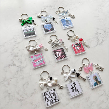 xg interactive album keychain