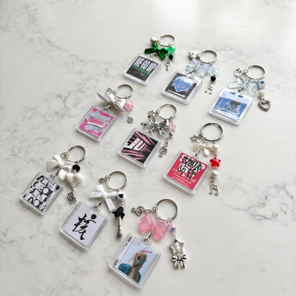 xg interactive album keychain