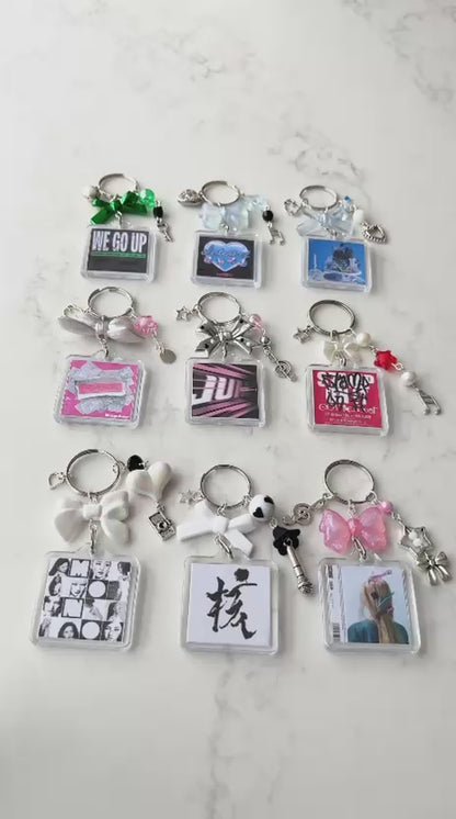 xg interactive album keychain